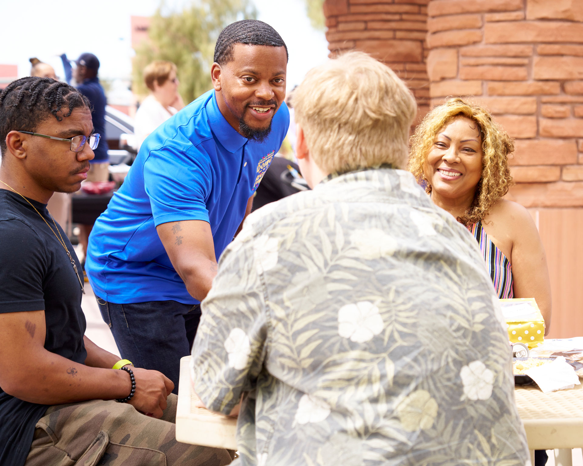 Public campaign photograph of Commissioner William McCurdy II connecting with Clark County community members